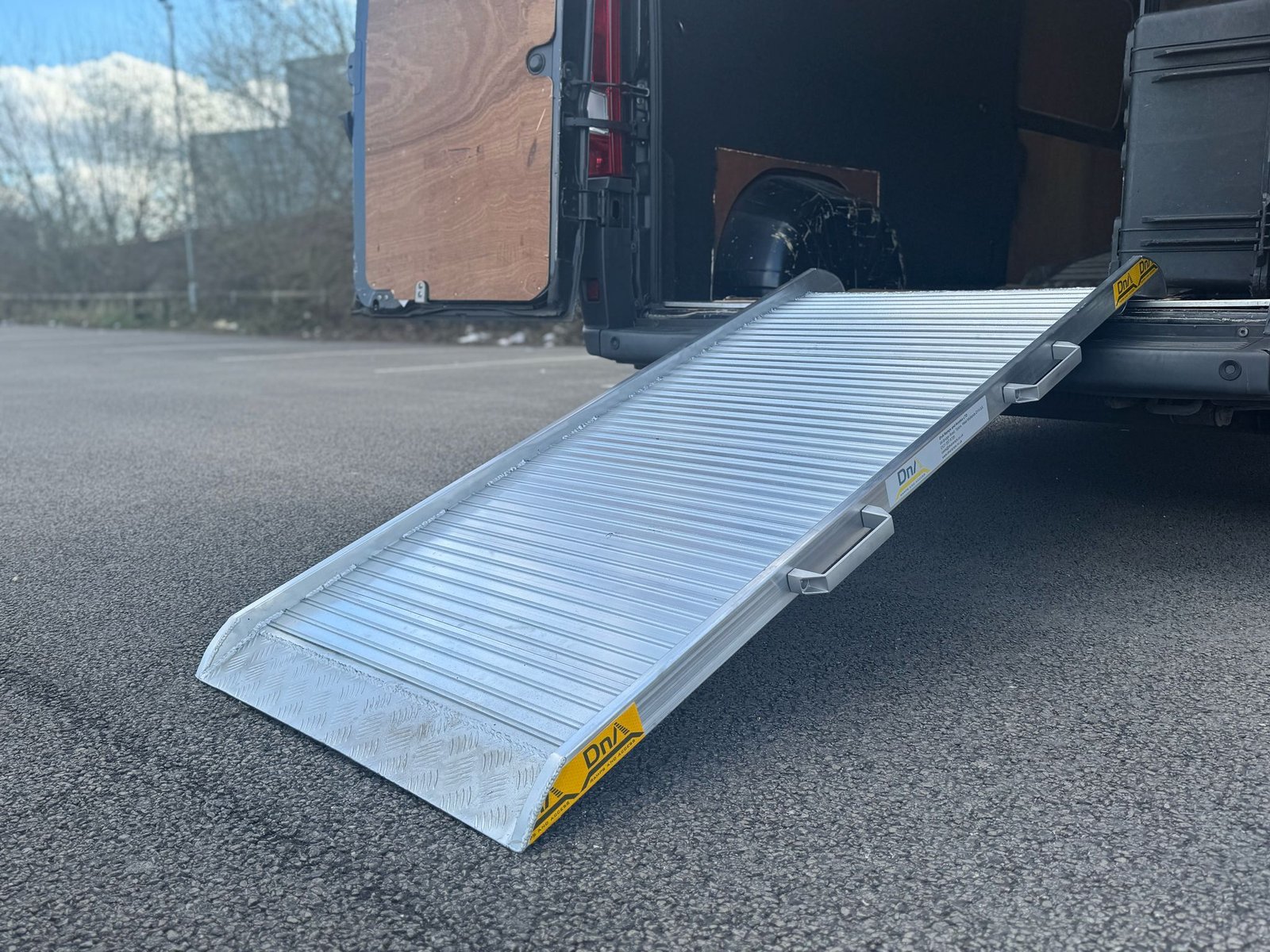 lightweight van ramp attached to van
