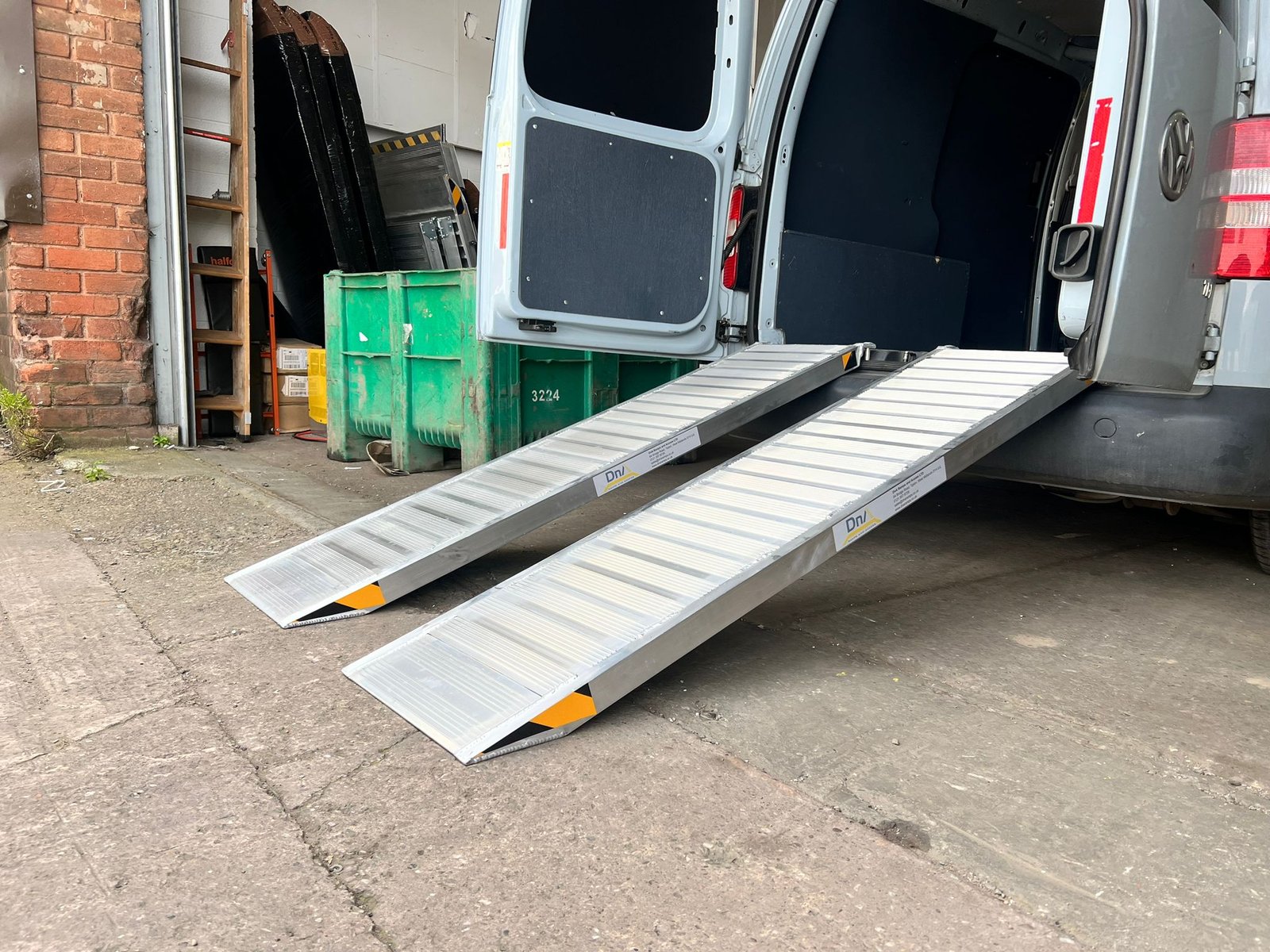 Portable Lightweight Trailer ramp attached to van